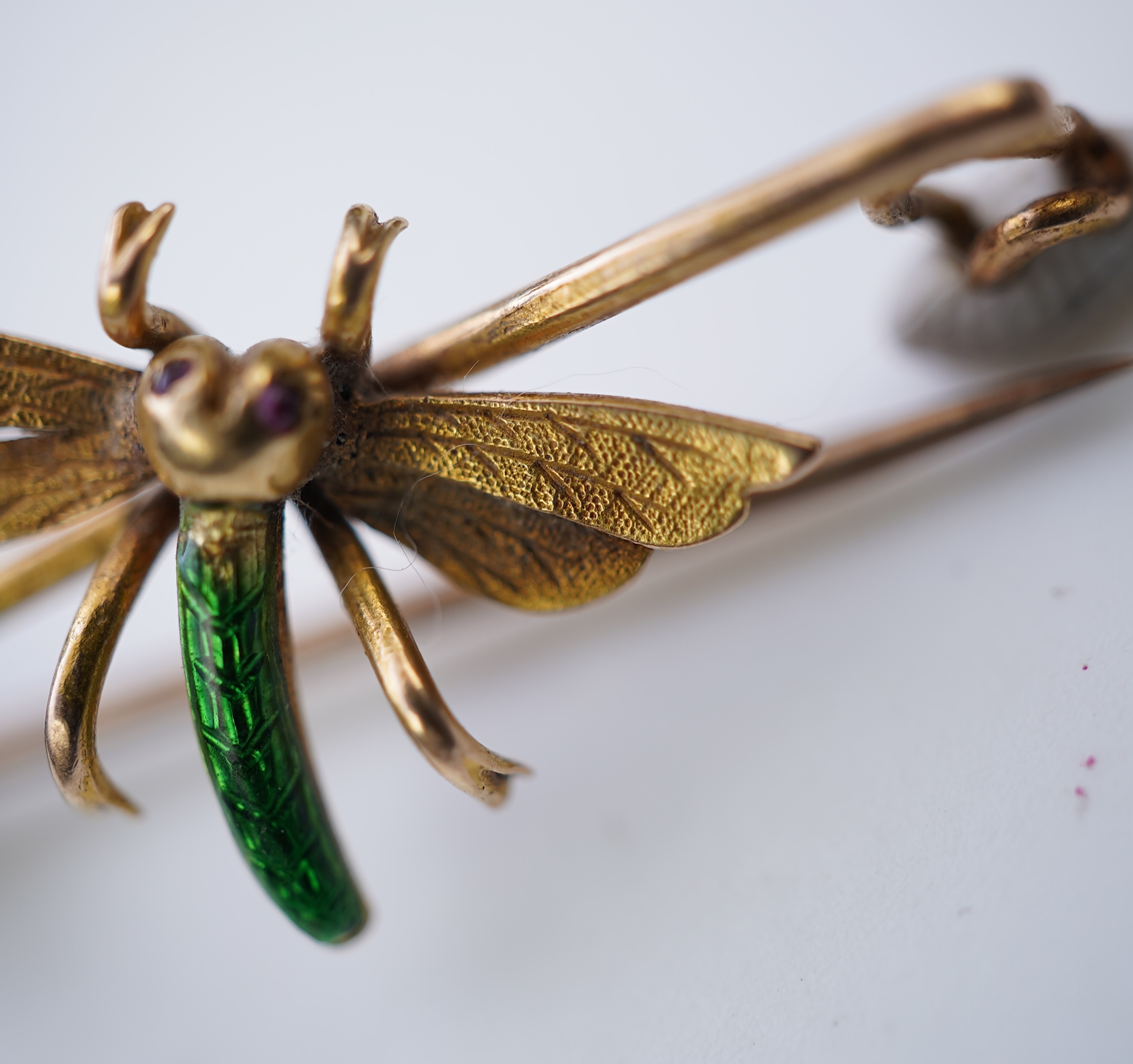 A gold and enamel brooch, early 20th century